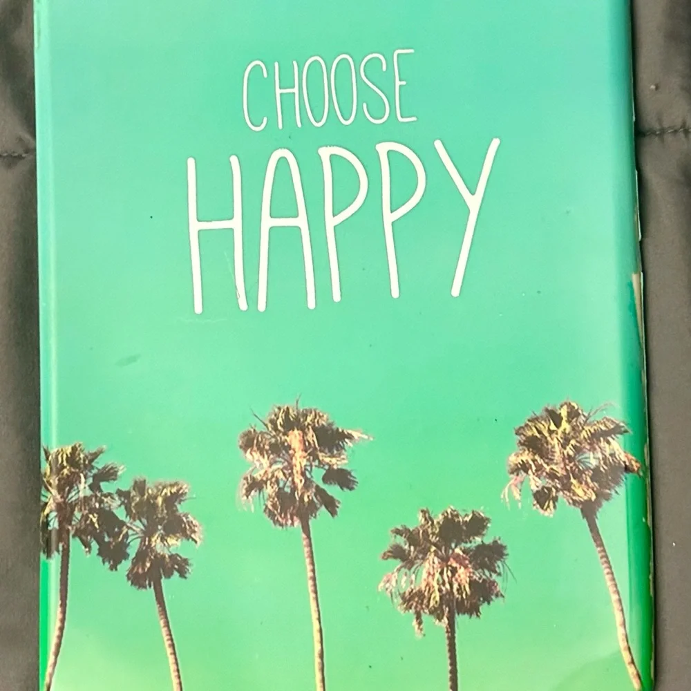 I pad cover green w Palm tree pattern. Silver text